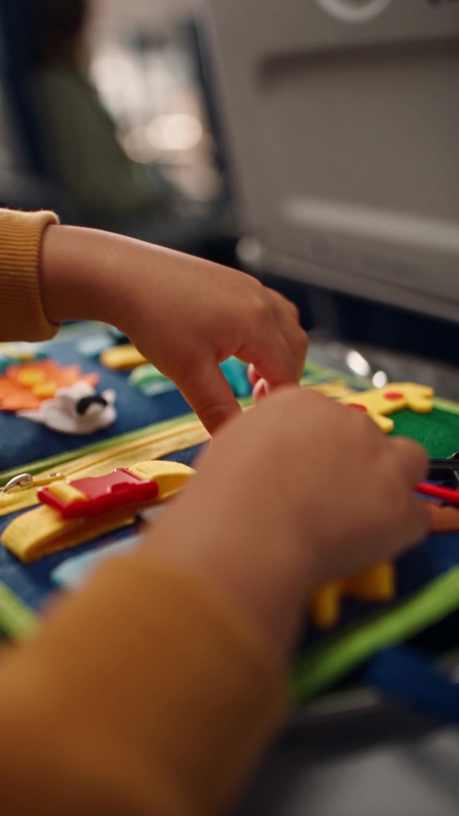 Colorful activity board being explored during a flight
